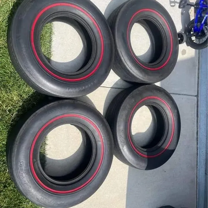 download 22 1 - Set of 4 G70-14 In Firestone red line wide oval Tires