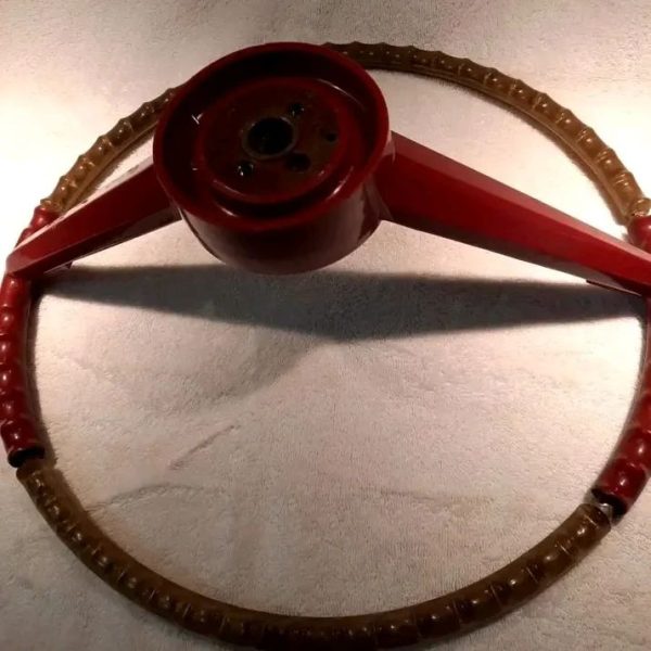 old parts18 600x600 - RED STEERING WHEEL FROM A 64 BONNEVILLE
